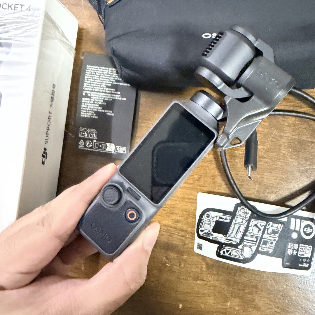 DJI Osmo Pocket 4 Standard Combo with freebies (Category: Cameras) located in Quezon City. Submitted by hoelygrailmnl (Listing ID 1469652303, Image 3). Description: l📸 FOR SALE: DJI Osmo Pocket 4 – Standard Combo 💰 Selling Price: ₱26,000 Original SRP: ₱29,490 ✨ Almost brand new! Bought in June 2026 and only opened to check the unit. Never used outdoors. No issues! Inclusions: * Complete original box and accessories * Portable carrying pouch * G