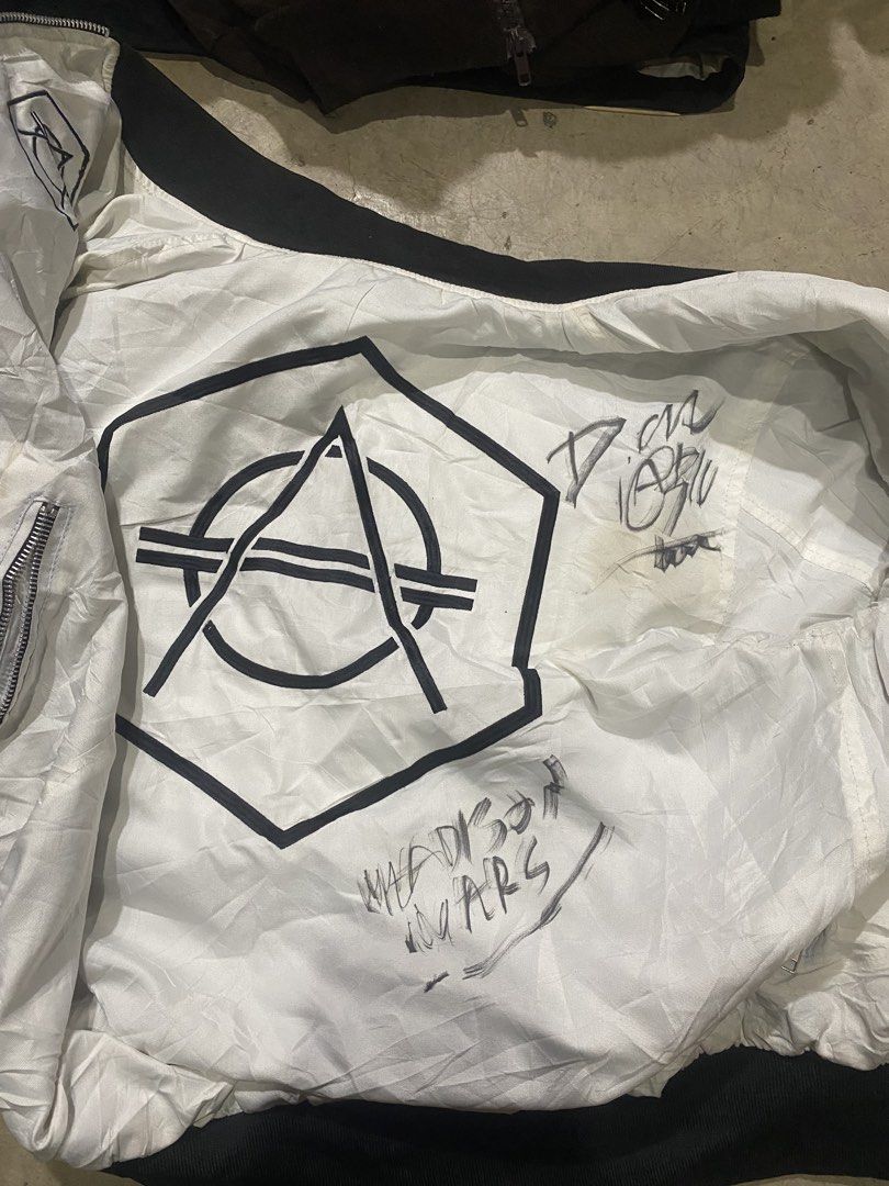 Don Diablo Reversible Bomber Jacket White Blue (Category: Coats, Jackets and Outerwear) located in Manila. Submitted by vastfalcon.f312db (Listing ID 1469721629, Image 3). Description: - Authentic Don Diablo reversible bomber jacket - Side 1: Solid white with black collar/cuffs, back logo, and rare hand-signed autographs - Side 2: Shiny navy blue with matching back logo - Features full-zip front, sleeve utility pocket, and side pockets - Conditio