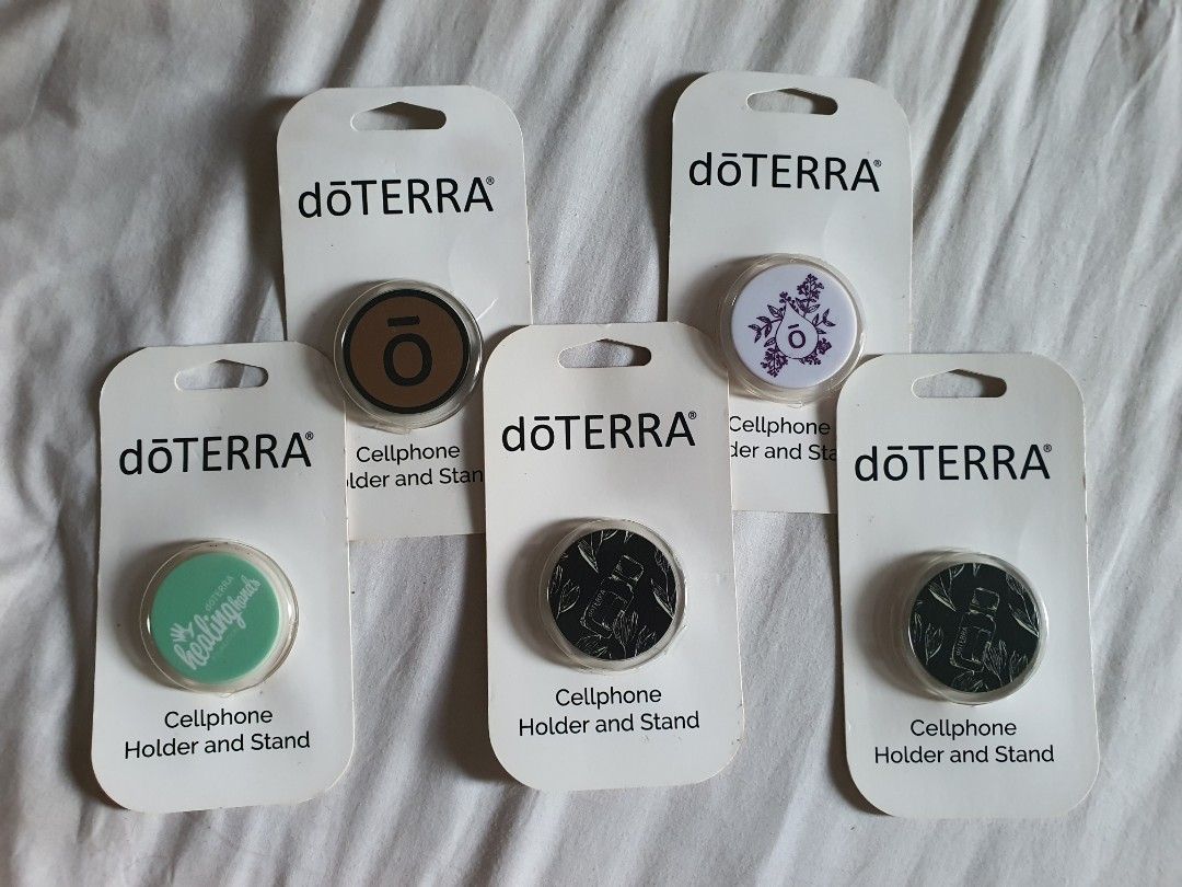 Doterra Cellphone holder/stand (Category: Everything Else Others) located in Paranaque City. Submitted by nicessities (Listing ID 1469638109, Image 1). Description: dōTERRA Cellphone Holder/Stand collectible Php 250 each purchased personally from US during doterra convention brand new, never used excess.