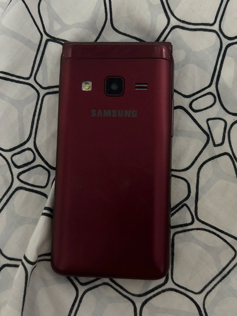 (Dupe) Samsung Folder 2 (Flip Phone) (Category: Samsung) located in Cebu City. Submitted by faithmacoto (Listing ID 1469699229, Image 3). Description: Has cracks but the touchscreen works well. Does not hinder the performance of the phone Has 2 batteries 1 micro usb charger 1 micro usb headphones You need to insert a micro sd card Camera quality is decent It can Call Text Spotify You can use fb but it’s highly discouraged because it gets laggy Po