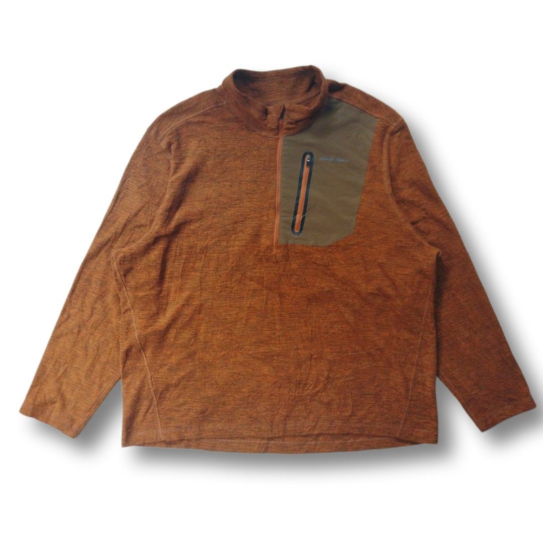 Eddie Bauer Brown Fleece 1/2 Zip Pullover (Category: Coats, Jackets and Outerwear) located in Cavite. Submitted by spinfits (Listing ID 1469710705, Image 1). Description: - Brand: Eddie Bauer - Style: 1/2 zip fleece pullover - Size: Men's XXL - Color: Warm brown heather with contrast olive green zippered chest pocket - Material: Soft polyester shell with durable nylon-spandex pocket - Care: Machine washable (warm), tumble dry low - Condition: Gre