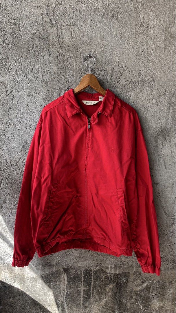 Eddie Bauer Red Cotton Zip-Up Jacket (Category: Coats, Jackets and Outerwear) located in Cabuyao City. Submitted by bulandos (Listing ID 1469581410, Image 1). Description: - Brand: Eddie Bauer - Size: Men's Medium - Color: Bright red with blue and green tartan plaid lining - Material: 100% Cotton - Features: Full zip front, front pockets, elastic cuffs and hem, classic collar with hidden plaid detail - Origin: Made in Hong Kong - Condition: Excel