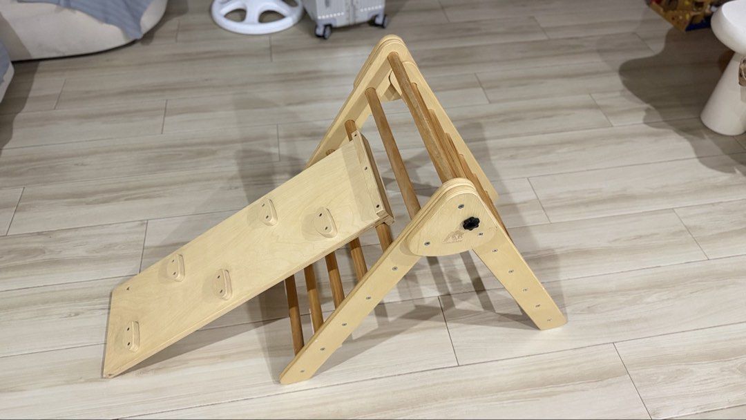 Educrate Wooden Climbing Triangle with Reversible Slide (Category: Infant Playtime) located in Manila. Submitted by sheebquiaonza (Listing ID 1469687506, Image 1). Description: Orig price is 5800 - Brand: Educrate wooden climbing triangle and ramp set - Finish: Natural wood - Features: Two-sided board (climbing holds on one side, smooth slide on the other) - Storage: Sturdy build that folds down easily - Benefit: Great indoor activity for toddler