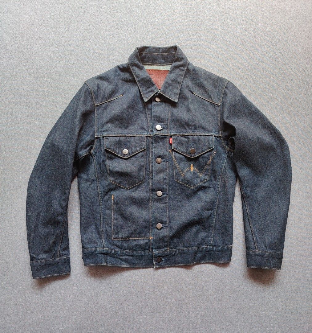 EDWIN E-Functional Denim Trucker Jacket (E2201-00) (Category: Coats, Jackets and Outerwear) located in Taguig. Submitted by _theroom.ph (Listing ID 1469636592, Image 1). Description: - Brand: Function Edwin - Style: Classic denim trucker jacket - Color: Clean dark wash indigo - Details: Front button closures, buttoned chest pockets with signature red tab - Accents: Contrasting stitching, branded metal buttons, and brown leather neck patch - Condi