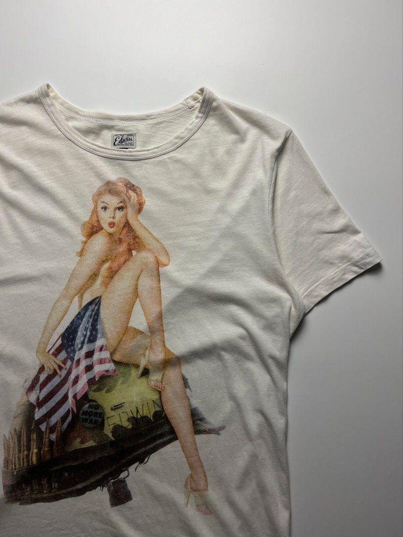 Edwin Nam Girl tee (Category: Tshirts & Polo Shirts ) located in Manila. Submitted by streetsavvy (Listing ID 1469675934, Image 2). Description: Edwin Nam Girl tee Size: Small Width: 19” Length: 27” Shoulder: 15” Sleeve Length: 7.5” Hem: 19.5” Measured in Inches Condition: Excellent condition Made in Portugal 100% Cotton .