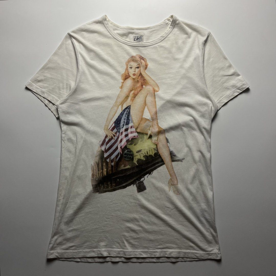 Edwin Nam Girl tee (Category: Tshirts & Polo Shirts ) located in Manila. Submitted by streetsavvy (Listing ID 1469675934, Image 1). Description: Edwin Nam Girl tee Size: Small Width: 19” Length: 27” Shoulder: 15” Sleeve Length: 7.5” Hem: 19.5” Measured in Inches Condition: Excellent condition Made in Portugal 100% Cotton .