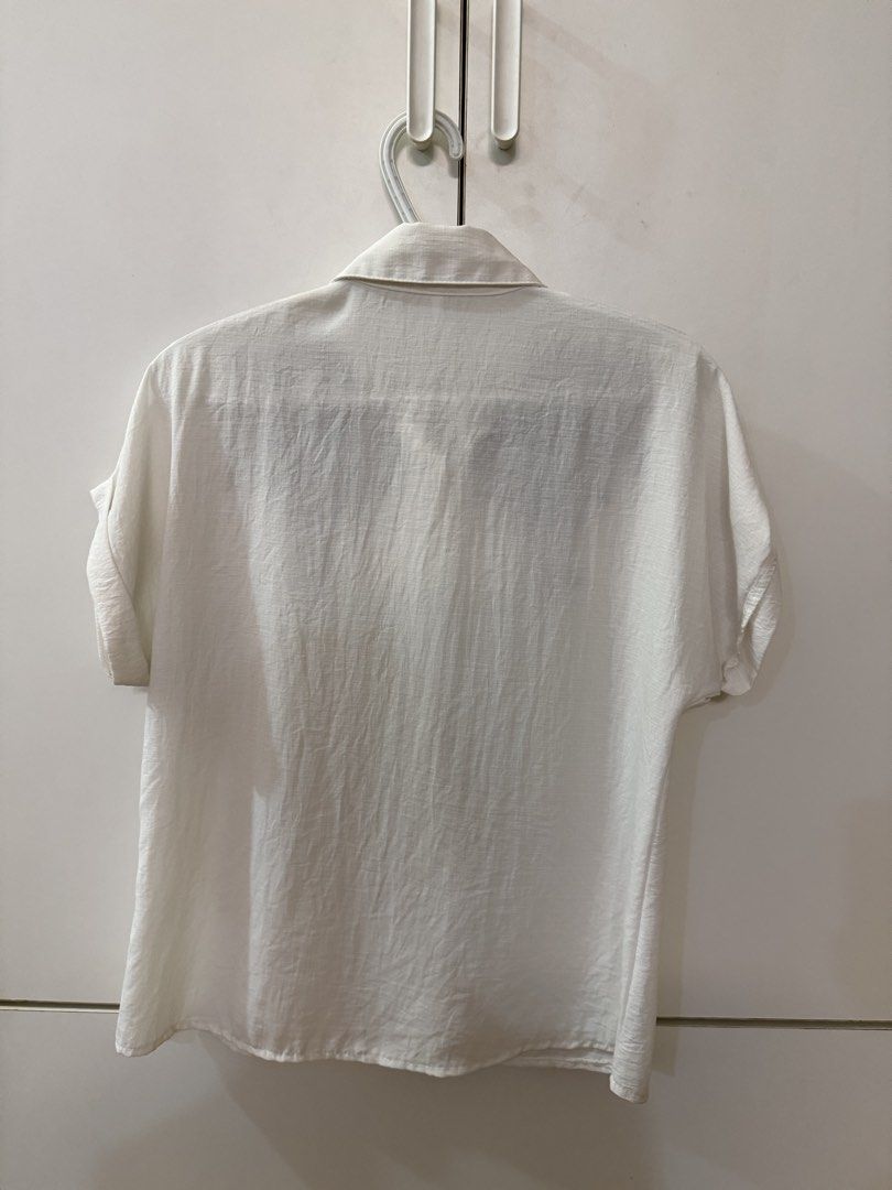 Embroidered Blue & White Polo (Category: Blouses) located in Quezon City. Submitted by hazpreloved (Listing ID 1469708880, Image 3). Description: Fits L-XL Actual photos posted Discounts available for bulk orders! Tags: sm woman, xara, paperdolls, so-en, calypso, essenxa, plus size .