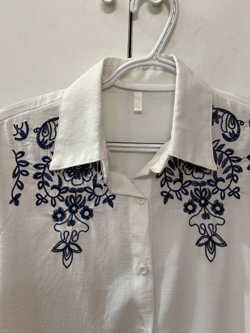Embroidered Blue & White Polo (Category: Blouses) located in Quezon City. Submitted by hazpreloved (Listing ID 1469708880, Image 2). Description: Fits L-XL Actual photos posted Discounts available for bulk orders! Tags: sm woman, xara, paperdolls, so-en, calypso, essenxa, plus size .
