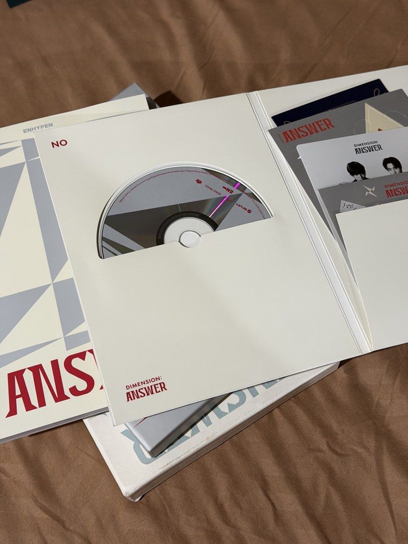 ENHYPEN Dimension: Answer Album Set (Category: K-Wave Merchandise) located in San Juan City. Submitted by fongypoo (Listing ID 1469674123, Image 2). Description: - ENHYPEN Dimension: Answer Album (2 versions) - Includes photo books, CDs, and stickers - Complete with inclusions as shown in photos - Clean copies, well-kept in storage - Perfect addition to any Engene collection -No photocards included -SOLD AS SET.