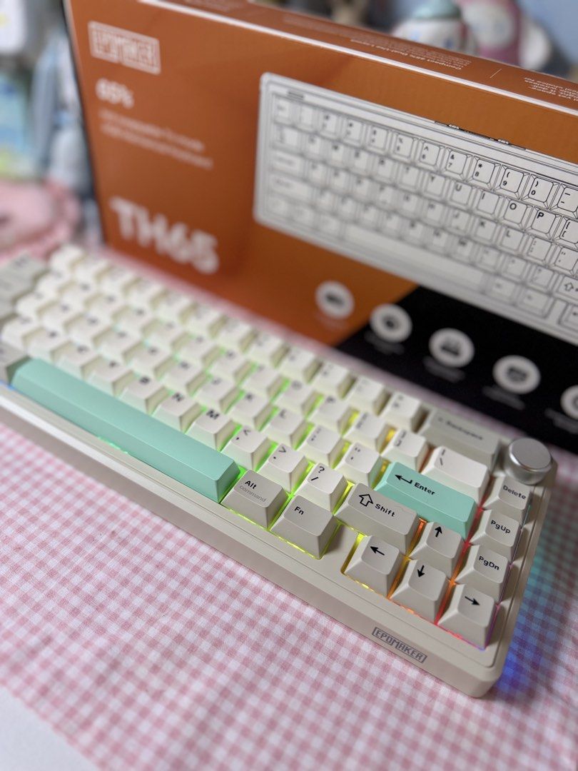 Epomaker TH65 65% Hot-Swappable Tri-Mode Mechanical Keyboard (Category: Computer Keyboard) located in Mabalacat. Submitted by strawbearytelle (Listing ID 1469601309, Image 3). Description: - Model: Epomaker TH65 Mechanical Keyboard - Colorway: Retro cream with mint green accents - Layout: 65% compact layout featuring a convenient volume knob - Connectivity: Hot-swappable tri-mode (wired, wireless, Bluetooth) - Lighting: Vibrant RGB backlighting a
