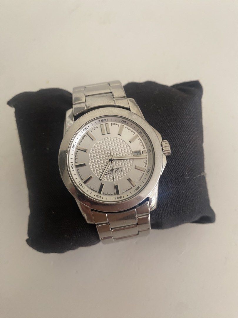 Esprit Silver Stainless Steel Analog Watch (Category: Women's Watches) located in Manila. Submitted by pems25 (Listing ID 1469583241, Image 1). Description: - Brand: Esprit - Color: Silver - Style: Classic everyday analog wristwatch - Dial: Textured circular background with date display at 3 o'clock - Details: Silver hands and markers with standard crown - Strap: Metal link bracelet.