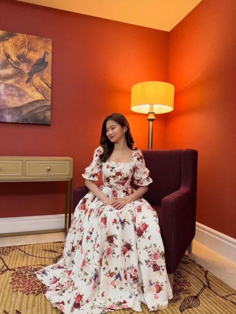 Everyday Hermana (Category: Dresses) located in Urdaneta. Submitted by pabilipongdress (Listing ID 1469752945, Image 1). Description: Gorgeous cream maxi dress with a red and pink floral print, square neckline, and puff sleeves. Worn only once for a quick photoshoot and in excellent, ready-to-wear condition..