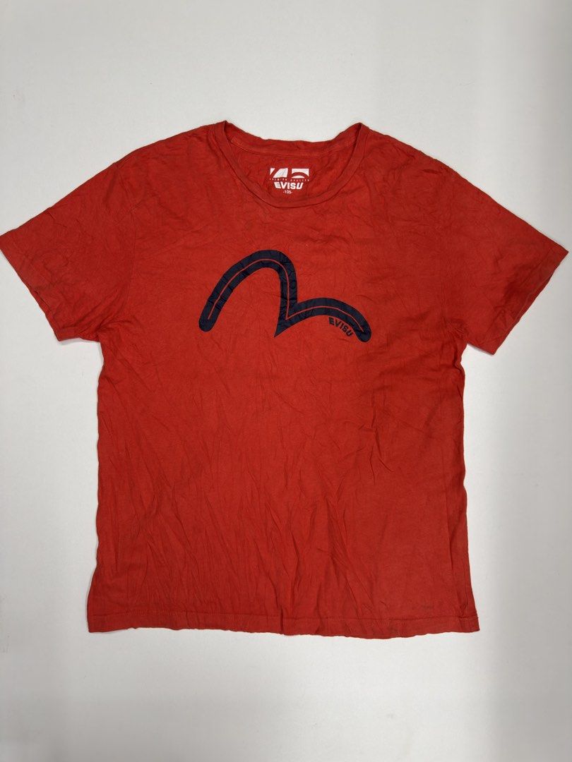 Evisu Red T-Shirt with Seagull Logo (Category: Tshirts & Polo Shirts ) located in Bustos. Submitted by thenlnclot60500 (Listing ID 1469589355, Image 1). Description: - Brand: Evisu - Color: Bright red with navy blue seagull logo - Size: 105 - Material: Comfortable premium cotton - Fit: Standard casual fit - Details: Crew neck, short sleeves, subtle branding on chest and upper back neckline.