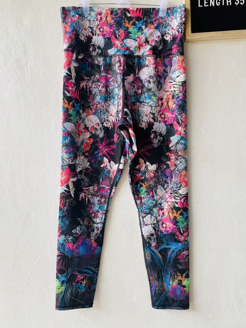Evolution and Creation Skull Floral Leggings (Category: Activewear) located in Caloocan City. Submitted by lovemyclothes21 (Listing ID 1469611386, Image 2). Description: - Brand/Model: Evolution and Creation Leggings - Design: Eye-catching colorful skull and floral graphic pattern - Size: L (Waist: 30 to 32 inches, Length: 35 inches) - Material: 85% polyester, 15% spandex (soft and stretchy) - Versatility: Perfect for workouts, yoga, or casual ev