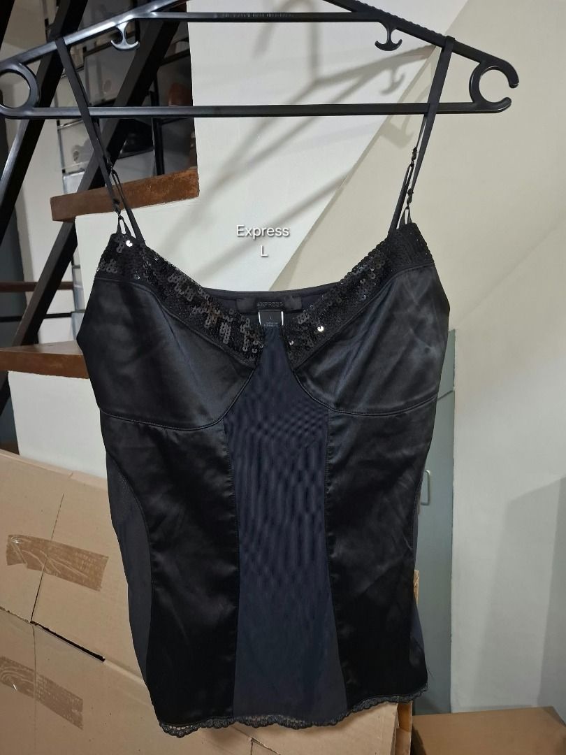 EXPRESS Black Sequin Camisole (Category: Sleeveless) located in Pasig City. Submitted by dripcounty (Listing ID 1469689131, Image 1). Description: EXPRESS Black Sequin Camisole ₱200 Bought in the Philippines Size: Large Condition: Good / preloved Black satin-look camisole with sequin neckline and lace hem. Actual item shown in photos. Delivery fee shouldered by buyer (Lalamove / other courier). Item price excludes delivery. Payment via cash / GCa
