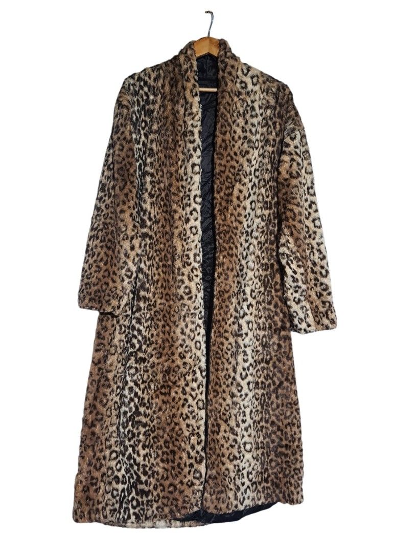 Faux Fur Leopard Print Long Winter Coat (Category: Coats, Jackets and Outerwear) located in Batangas. Submitted by yanaspreloved1 (Listing ID 1469697662, Image 2). Description: Long leopard print coat in brown and black tones. Made with soft faux fur material. Open front design with a shawl collar. Fully lined inside in solid black fabric. Hits around ankle length depending on height. Warm statement piece for cold weather outfits. Clean overall l