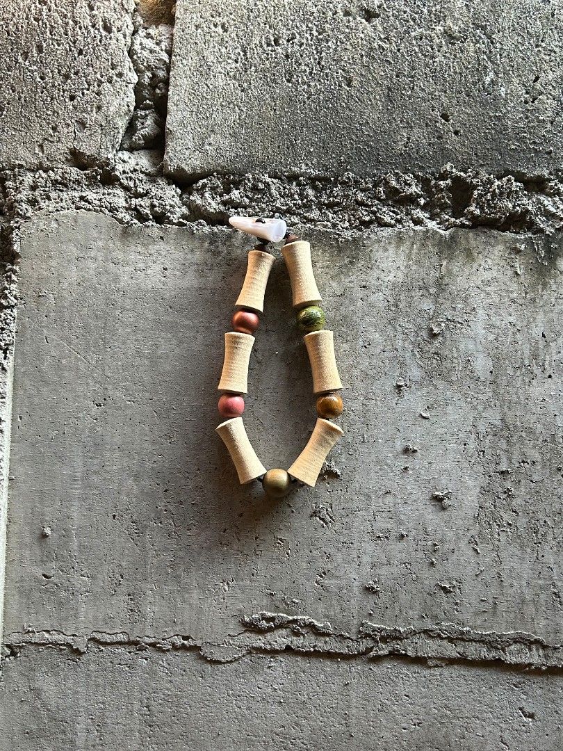 Femur necklace (Category: Necklaces) located in Manila. Submitted by iyo.artifacts (Listing ID 1469724513, Image 3). Description: ☆FEMUR☆ In mixed wood and wood, with horn lock in nylon string. 350 php each ONE OF ONE 18 inches long (upsize dm) The color may appear slightly different in real life compared to the photo, but rest assured, it will be even more beautiful when seen in real life colors..