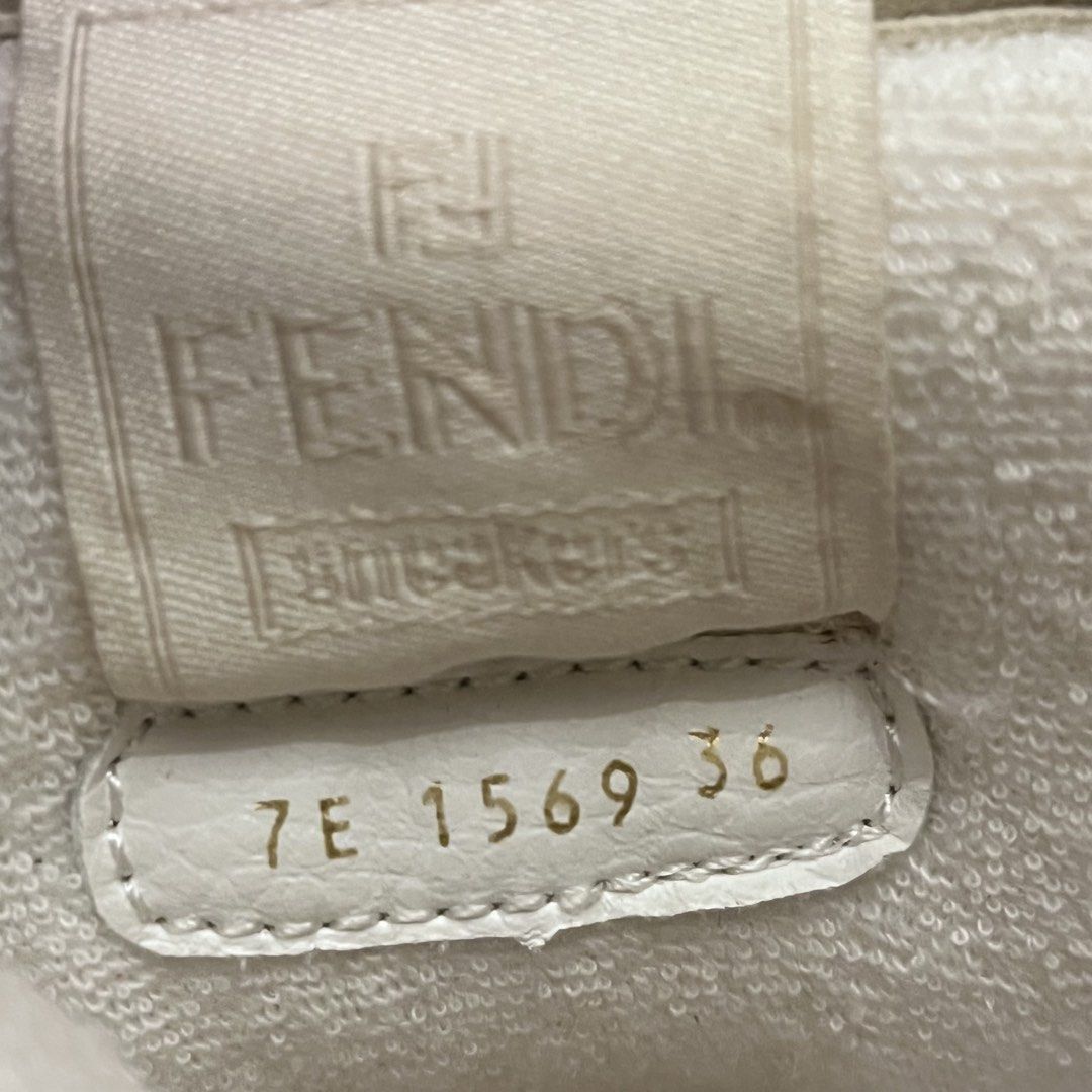 FF MATCH High Top Sneakers White Suede (Category: Sneakers) located in Paranaque City. Submitted by toastedmallows (Listing ID 1469726226, Image 3). Description: Fendi Match Sneakers Color: Cream White Features the Fendi logo Sizes Available: 36, 38, 39, 44 & 45EU Suede and leather construction Brandnew. No box. Comes with Fendi dustbag Ships via J&T MOP Gcash, Paymaya or BPI - NO COD shoes may or may not have minimal dustmarks.