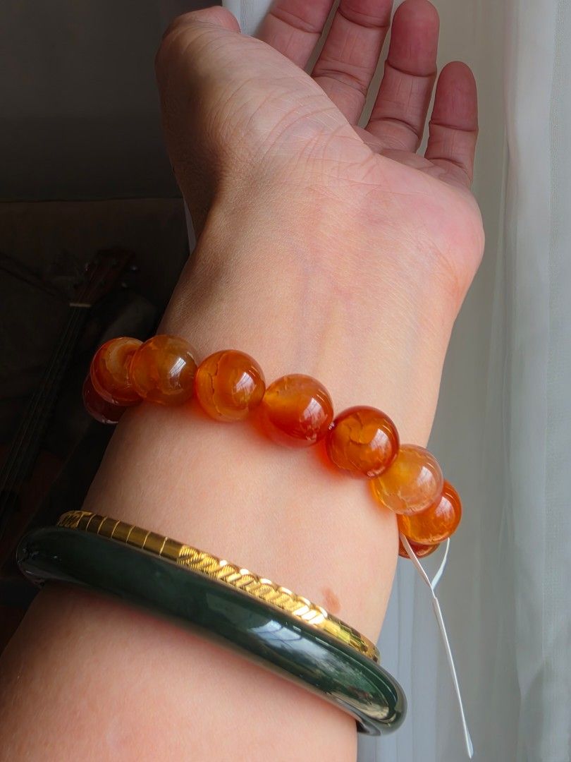 Fire Quartz heart charms bracelet (Category: Bracelets) located in Manila. Submitted by cavalierdolls (Listing ID 1469575579, Image 2). Description: 🔥❤️ FIRE QUARTZ HEART CHARMS BRACELET ❤️🔥 Fiery shades of red, orange, and golden amber come together in this stunning bracelet! ✨🧡 Featuring a gorgeous faceted Fire Quartz heart charm paired with glowing orange-red beads and elegant gold-tone accents, this bracelet is a beautiful statement piece 