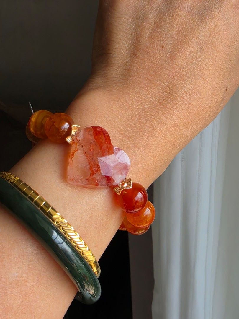 Fire Quartz heart charms bracelet (Category: Bracelets) located in Manila. Submitted by cavalierdolls (Listing ID 1469575579, Image 1). Description: 🔥❤️ FIRE QUARTZ HEART CHARMS BRACELET ❤️🔥 Fiery shades of red, orange, and golden amber come together in this stunning bracelet! ✨🧡 Featuring a gorgeous faceted Fire Quartz heart charm paired with glowing orange-red beads and elegant gold-tone accents, this bracelet is a beautiful statement piece 