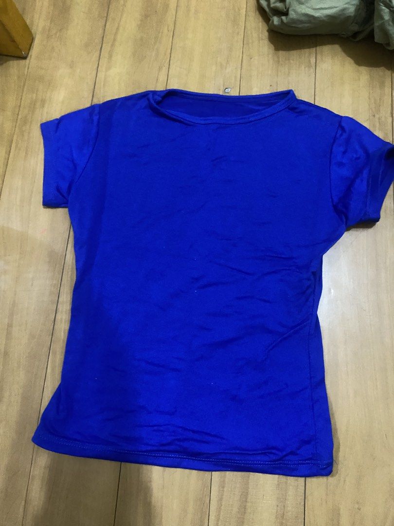 FITTED BLUE SHIRT (Category: Shirts) located in Marikina City. Submitted by ctgccc (Listing ID 1469691759, Image 1). Description: SIZE: xs to small (stretchy) COLOR: blue (brighter in person) FIT: fit - double lined.