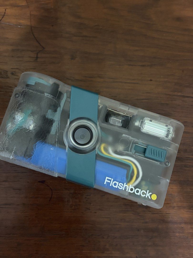 Flashback One35 v2 (Category: Cameras) located in Quezon City. Submitted by lemonlime91 (Listing ID 1469692207, Image 2). Description: - Model: Flashback One35 v2 Digital Camera - Color/Design: Transparent/Teal - Condition: Opened to test it only, still brand new, working well - Inclusions: Comes complete with the original packaging box - Bought it for 7,580 - MOP: Gcash or BPI only.