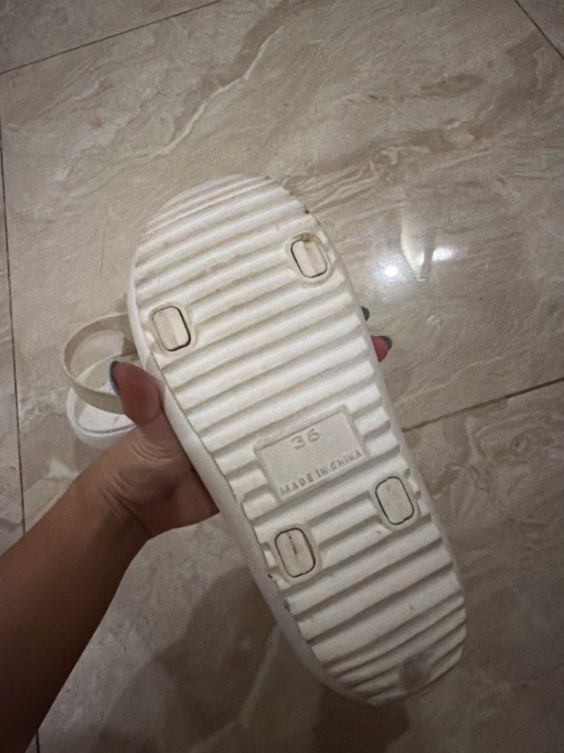 Flipflop White chunky platform sandals size 36 (Category: Sandals) located in Paranaque City. Submitted by TrendyBoutique.ph (Listing ID 1469667991, Image 2). Description: - Style: White chunky platform sandals - Size: 36 (printed on sole) - Features: Adjustable velcro straps & thick ridged rubber outsole for grip - Comfort: Great for walking and easy to adjust - Condition: dusty lang po but in good condition .