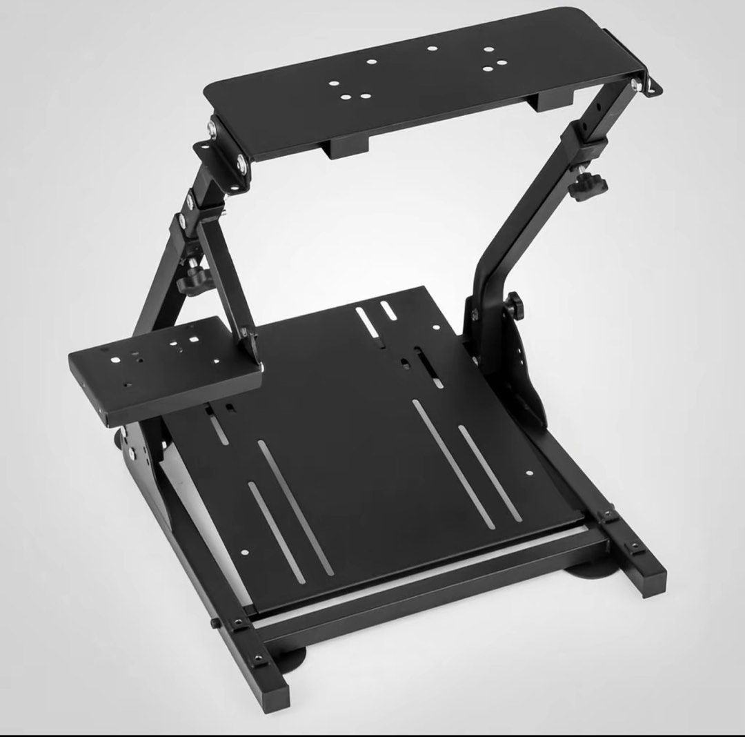 Foldable Racing Simulator Steering Wheel Stand (Category: Other Accessories) located in Manila. Submitted by jvzzz08 (Listing ID 1469575742, Image 3). Description: Brand new never use for only 2000 0 Foldable Racing Simulator Steering Wheel Stand Space-Saving Foldable Design Tight on space? No problem! Our foldable design allows you to easily stow away the stand when not in use. Perfect for gamers with limited space. 📦 Product Specifications Bas