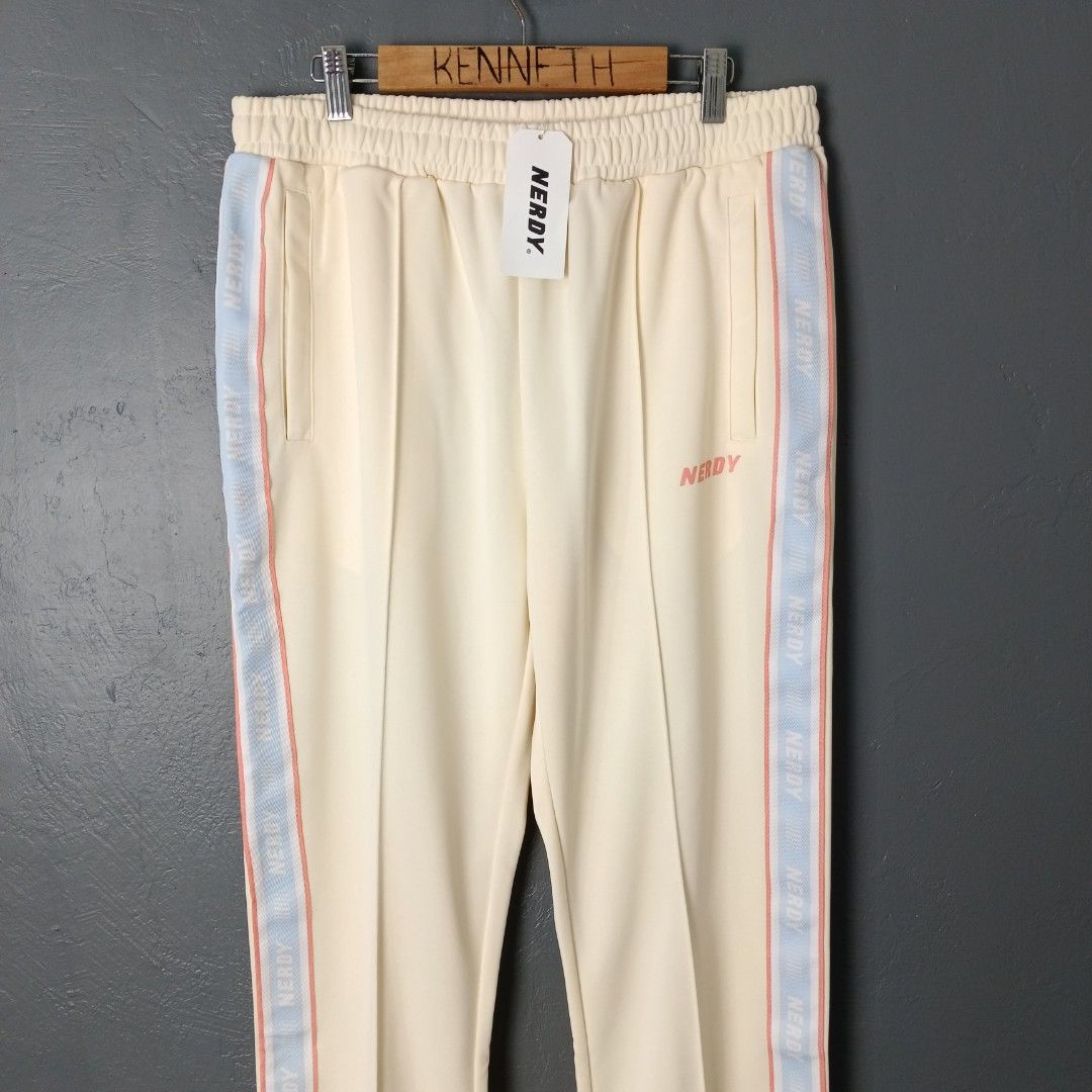 For Men - Nerdy - Logo Taped Track Pants (Category: Trousers) located in Bacolod City. Submitted by drop.ph (Listing ID 1469616249, Image 3). Description: Nerdy - Logo Taped Track Pants Authentic *Ankle Zip *Fits 32-34, Length - 40 *Leg Opening - 8 *Brand New w Tags *Minor stain *Price: 680php *Add SF if outside Bacolod City .