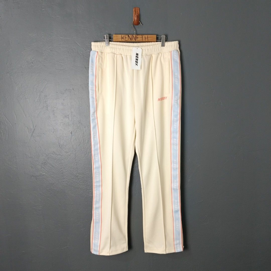 For Men - Nerdy - Logo Taped Track Pants (Category: Trousers) located in Bacolod City. Submitted by drop.ph (Listing ID 1469616249, Image 1). Description: Nerdy - Logo Taped Track Pants Authentic *Ankle Zip *Fits 32-34, Length - 40 *Leg Opening - 8 *Brand New w Tags *Minor stain *Price: 680php *Add SF if outside Bacolod City .