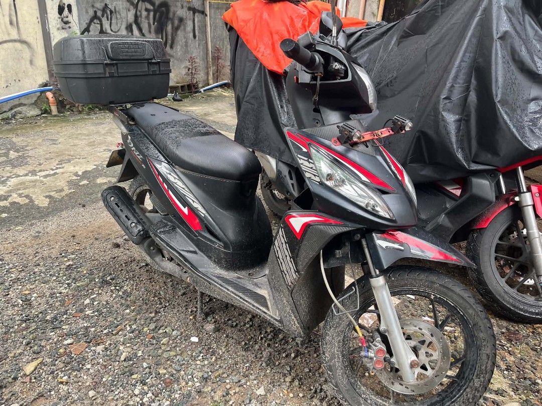 For Sale TVS Dazz 110 (Category: Motorbikes for Sale) located in Manila. Submitted by dj.kaceyv (Listing ID 1469607420, Image 2). Description: For Sale: TVS Dazz 110 2018 model °with mini driving light & Givibox (1key) •67000 Odo •Complete original docs (1 Key) •New belt, rear tire, spark plug, battery, seat cover, handle grip. •Newly change oil (gear&engine), CVT cleaning.