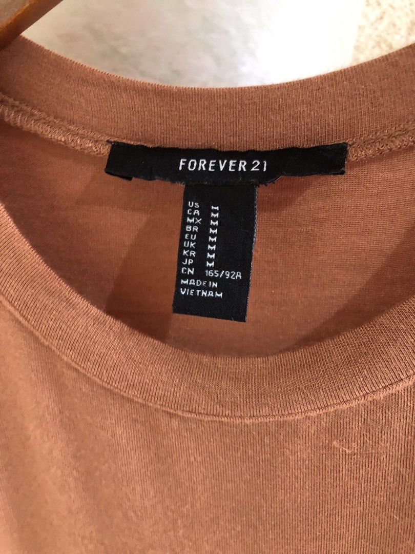 FOREVER 21 bodysuit (Category: Others Tops) located in Santa Rosa. Submitted by eceldg05 (Listing ID 1469606767, Image 2). Description: F21 bodysuit Cotton flowy fabric Med/large Excellent.