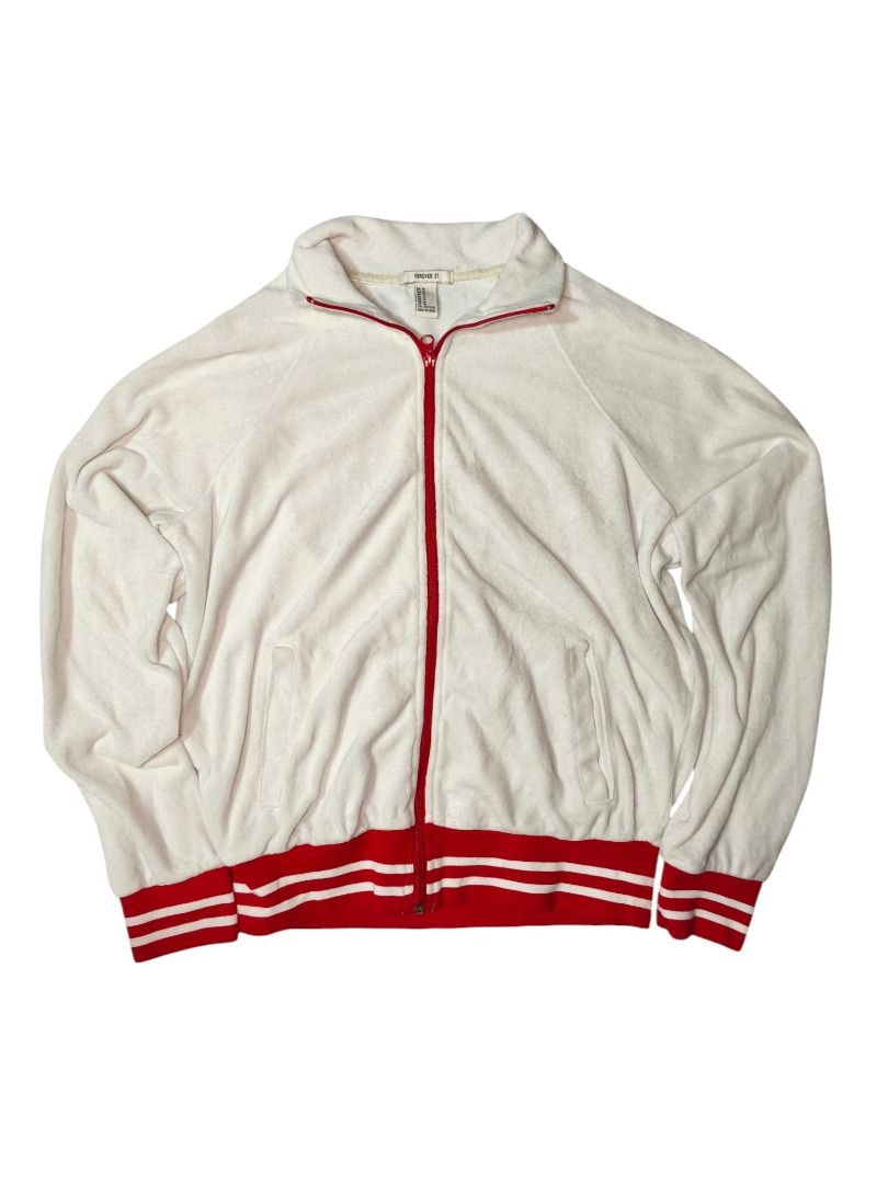 FOREVER 21 TRACK JACKET (Category: Coats, Jackets and Outerwear) located in Baguio. Submitted by boneteezandharmony (Listing ID 1469664902, Image 2). Description: White zip-up jacket with bold red zipper and striped ribbed hems. Simple sporty piece with a retro-inspired look..