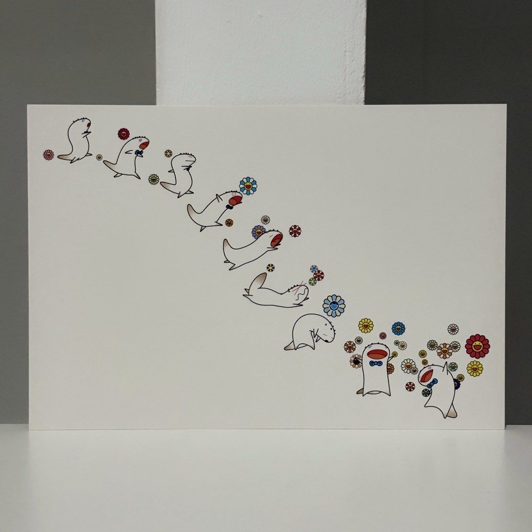 Framed Takashi Murakami Postcard “Contented Shacho” (Category: Art & Prints) located in Santa Rosa. Submitted by shikaricollectibles (Listing ID 1469621393, Image 3). Description: Framed Takashi Murakami Postcard “Contented Shacho” An art postcard featuring Takashi Murakami, released in 2004. Postcard Size: 6.9 x 4.75 inches Frame Size: 11.5 x 9.7 inches Frame Thickness: 1 inches Frame Color: White Glazing: Glass Mat Border: 2 Inches Mat Color: O