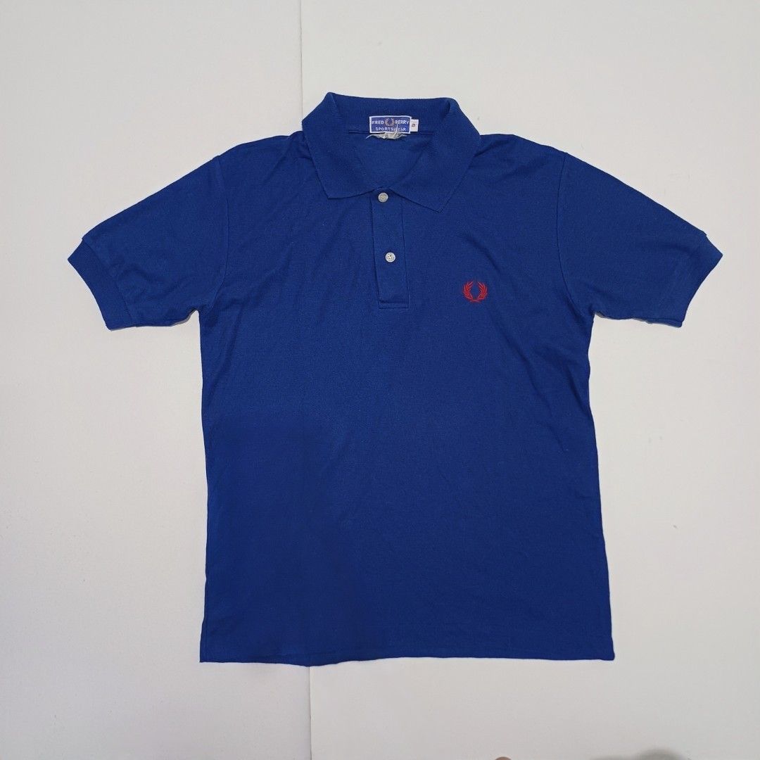 Fred Perry Blue Polo Shirt (Category: Tshirts & Polo Shirts ) located in Pasig City. Submitted by padillaaub64242 (Listing ID 1469653206, Image 1). Description: - Brand: Fred Perry - Size Small on tag fit to Medium -19×25 Inches.