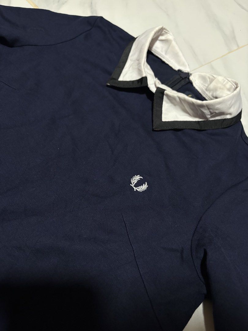 Fred Perry Navy Polo Dress (Category: Dresses) located in Baguio. Submitted by thriftedbaguio (Listing ID 1469620146, Image 3). Description: Excellent Condition Size 10 Tagged Dimensions 18*36 Color rate 10 .