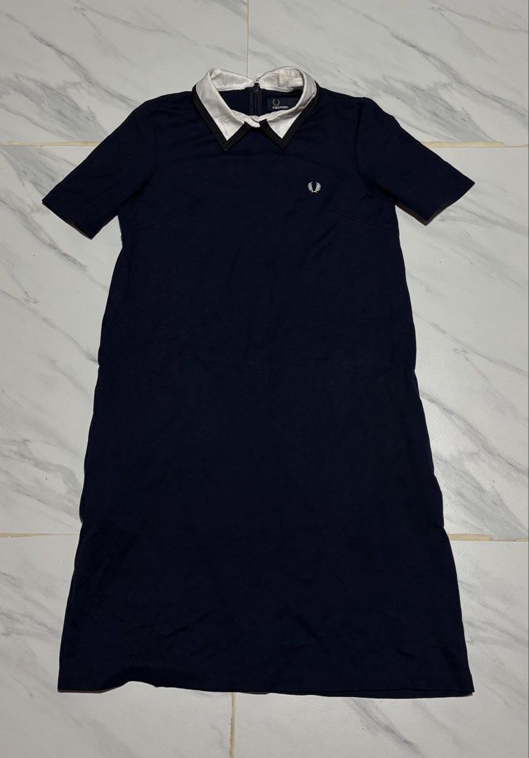 Fred Perry Navy Polo Dress (Category: Dresses) located in Baguio. Submitted by thriftedbaguio (Listing ID 1469620146, Image 1). Description: Excellent Condition Size 10 Tagged Dimensions 18*36 Color rate 10 .