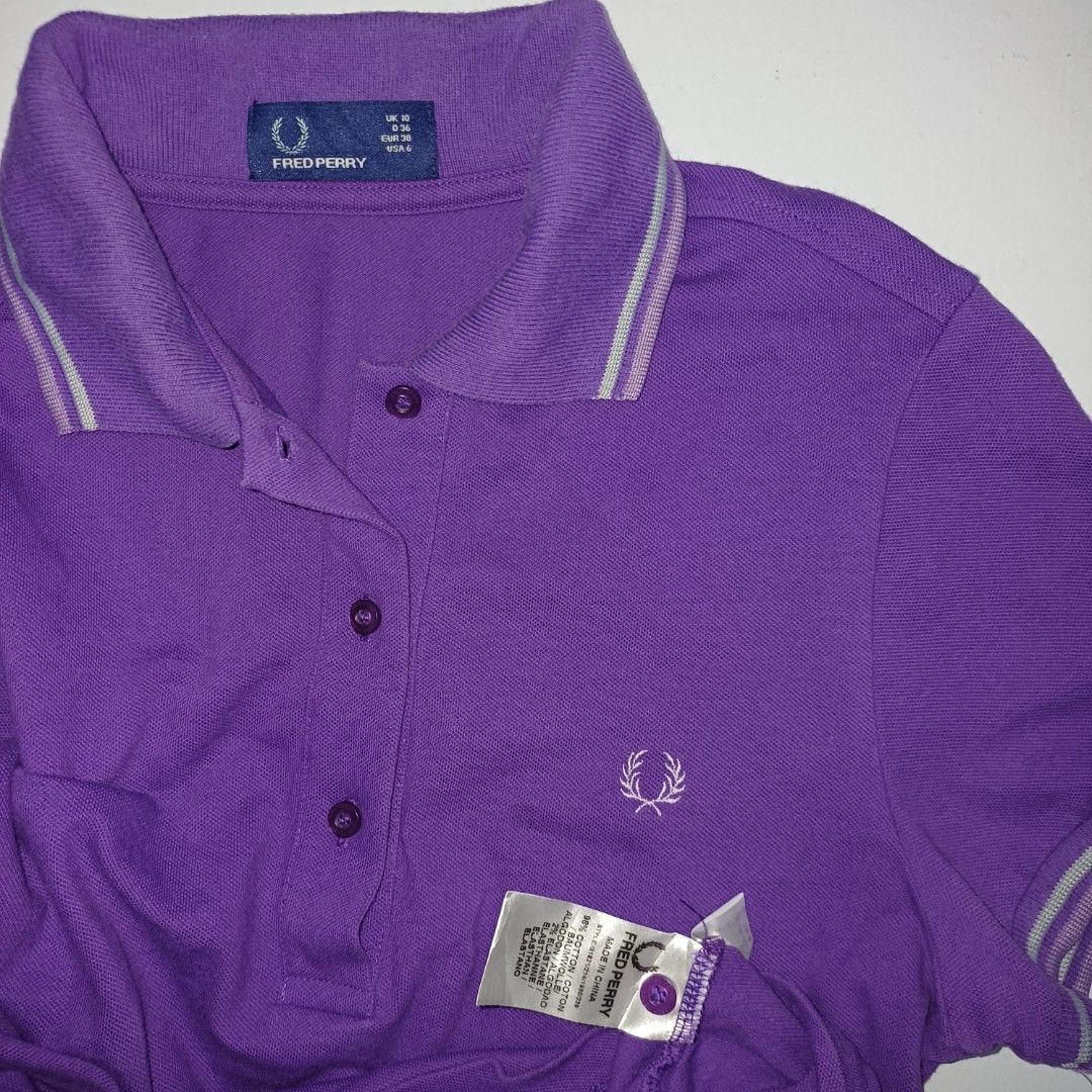 Fred Perry Purple Polo Shirt (Category: Shirts) located in Pasig City. Submitted by padillaaub64242 (Listing ID 1469652820, Image 2). Description: - Brand: Fred Perry - Color: Purple - Size Small -16×28 Inches.