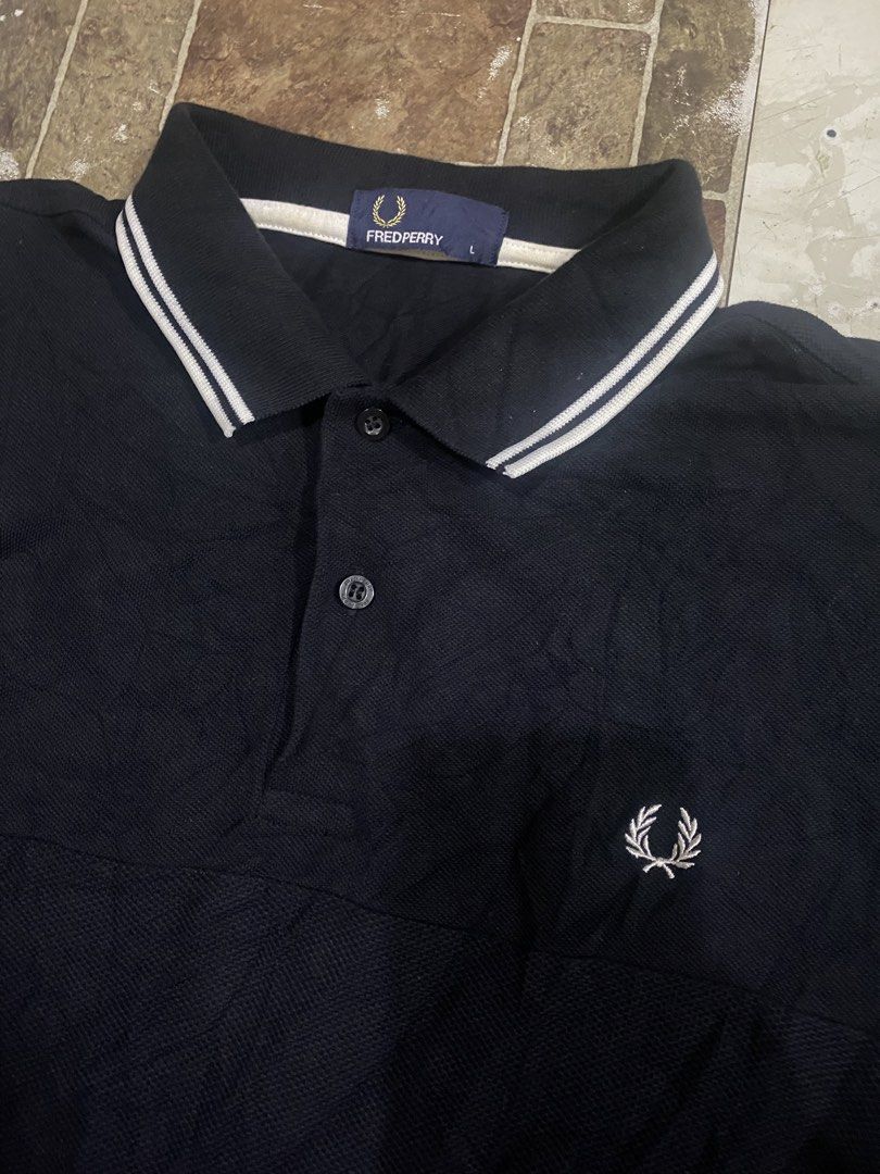 FredPerry polo shirt (Category: Tshirts & Polo Shirts ) located in Tagoloan. Submitted by puretiger-389e (Listing ID 1469684663, Image 2). Description: FredPerry polo shirt As new condition Size Large 22x31 dimensions No issue.