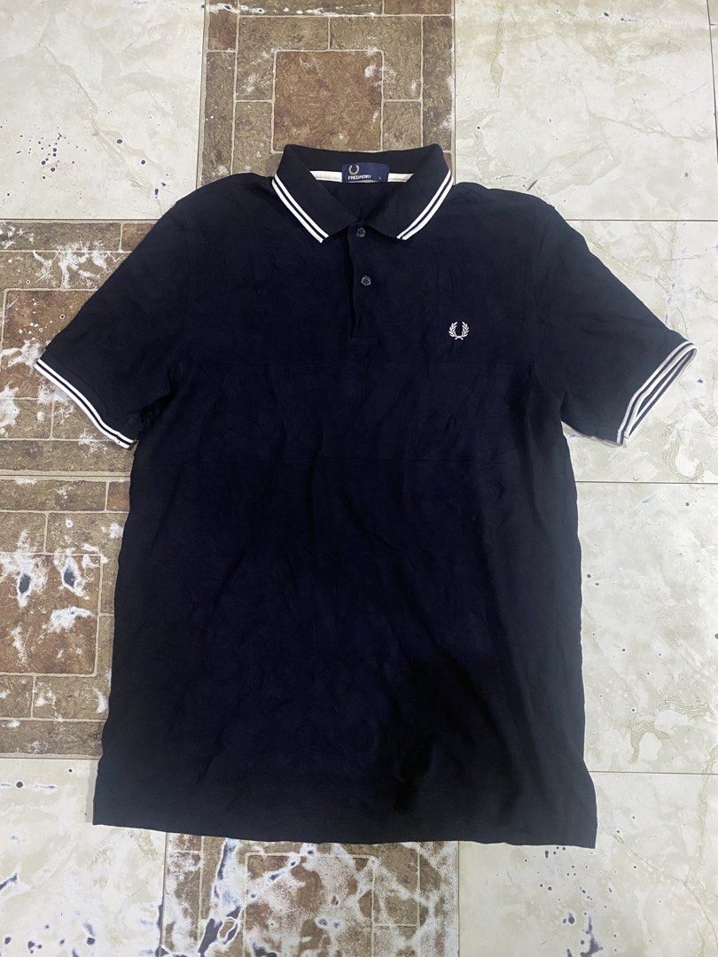 FredPerry polo shirt (Category: Tshirts & Polo Shirts ) located in Tagoloan. Submitted by puretiger-389e (Listing ID 1469684663, Image 1). Description: FredPerry polo shirt As new condition Size Large 22x31 dimensions No issue.