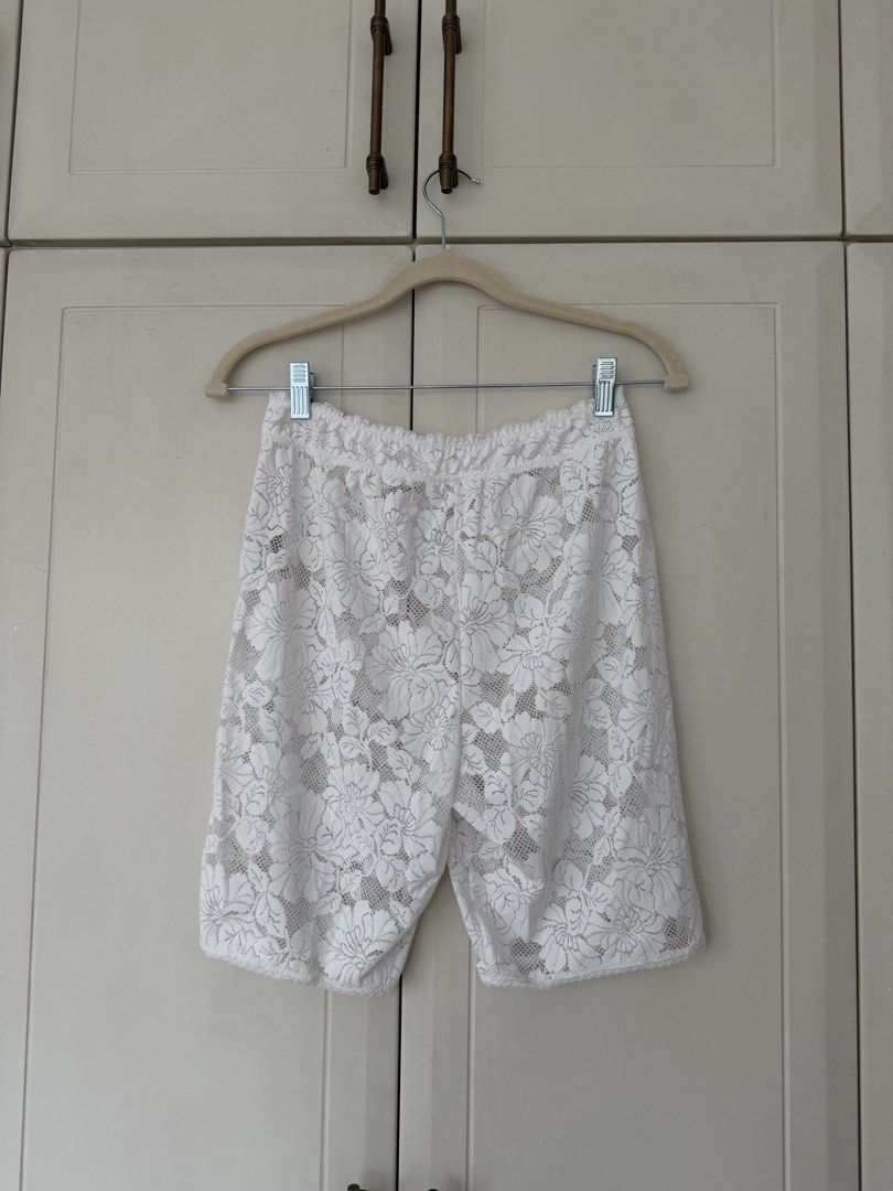 Free People White Lace Shorts (Category: Shorts) located in Makati City. Submitted by belizalde4 (Listing ID 1469657201, Image 3). Description: - Brand: Intimately Free People - Size: M - Color: White - Material: Delicate sheer floral lace with stretchy elastic waistband - Style: Biker shorts, great for layering under oversized shirts or dresses.