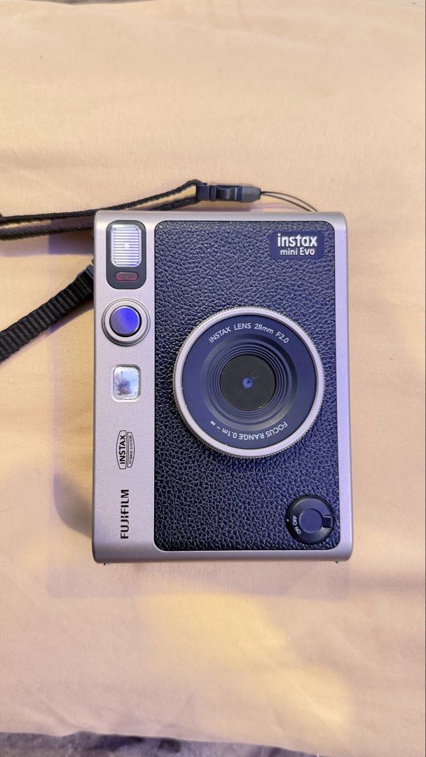 Fujifilm Instax Mini Evo Hybrid Instant Camera (Category: Cameras) located in Valenzuela. Submitted by deztinyy (Listing ID 1469698129, Image 2). Description: -with sdcard (32gb) -case -camera bag -orig type c charger -no box, but can provide one once it has been shipped -with minimal dents but not so visible.