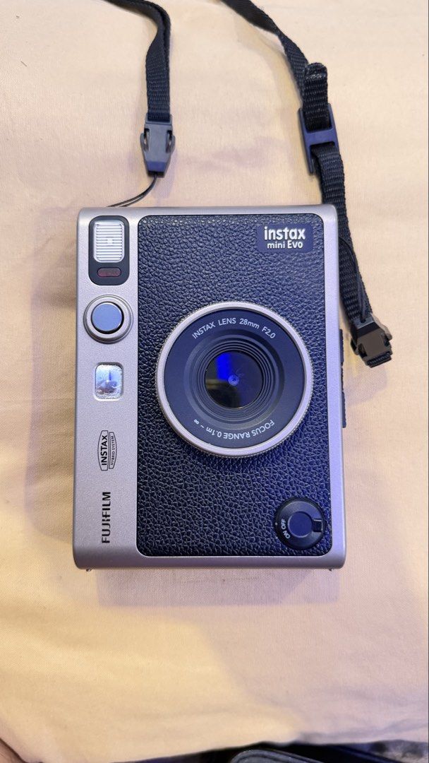 Fujifilm Instax Mini Evo Hybrid Instant Camera (Category: Cameras) located in Valenzuela. Submitted by deztinyy (Listing ID 1469698129, Image 3). Description: -with sdcard (32gb) -case -camera bag -orig type c charger -no box, but can provide one once it has been shipped -with minimal dents but not so visible.