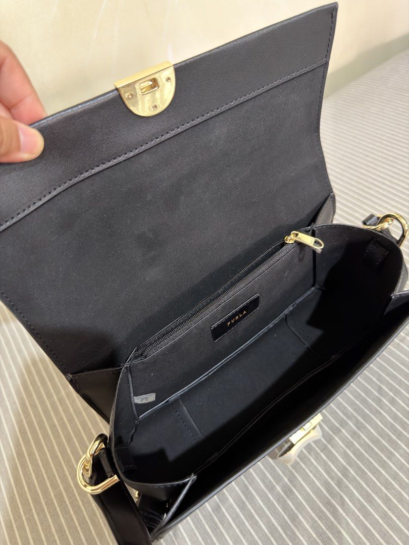 Furla Eclisse Crossbody (Category: Cross-body Bags) located in San Mateo. Submitted by ktrnugh (Listing ID 1469614748, Image 3). Description: Furla Eclisse Crossbody (Regular size) Color: Nero / Black Condition: Excellent — used once only! Store-bought (June 2026) / authentic Comes with original dust bag , crossbody strap RFS: Decluttering 📍Batasan Hills, QC Delivery: Same-day delivery via Grab or Lalamove (shipping fee to be shouldered by the b