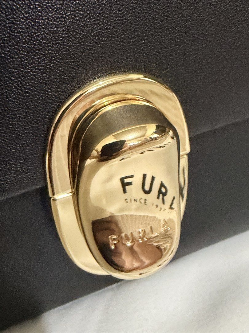 Furla Eclisse Crossbody (Category: Cross-body Bags) located in San Mateo. Submitted by ktrnugh (Listing ID 1469614748, Image 2). Description: Furla Eclisse Crossbody (Regular size) Color: Nero / Black Condition: Excellent — used once only! Store-bought (June 2026) / authentic Comes with original dust bag , crossbody strap RFS: Decluttering 📍Batasan Hills, QC Delivery: Same-day delivery via Grab or Lalamove (shipping fee to be shouldered by the b