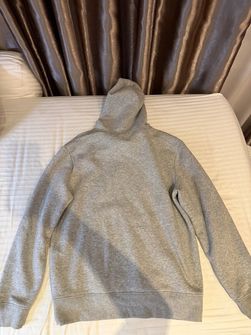 GAP Grey Hoodie Size M (Category: Hoodies) located in Muntinlupa City. Submitted by golf823 (Listing ID 1469681443, Image 3). Description: - Size: Medium - Color: Classic Grey - Design: Embroidered GAP logo on chest - Features: Drawstring hood & front kangaroo pocket - Interior: Soft fleece lining - Condition: Clean and ready to wear.