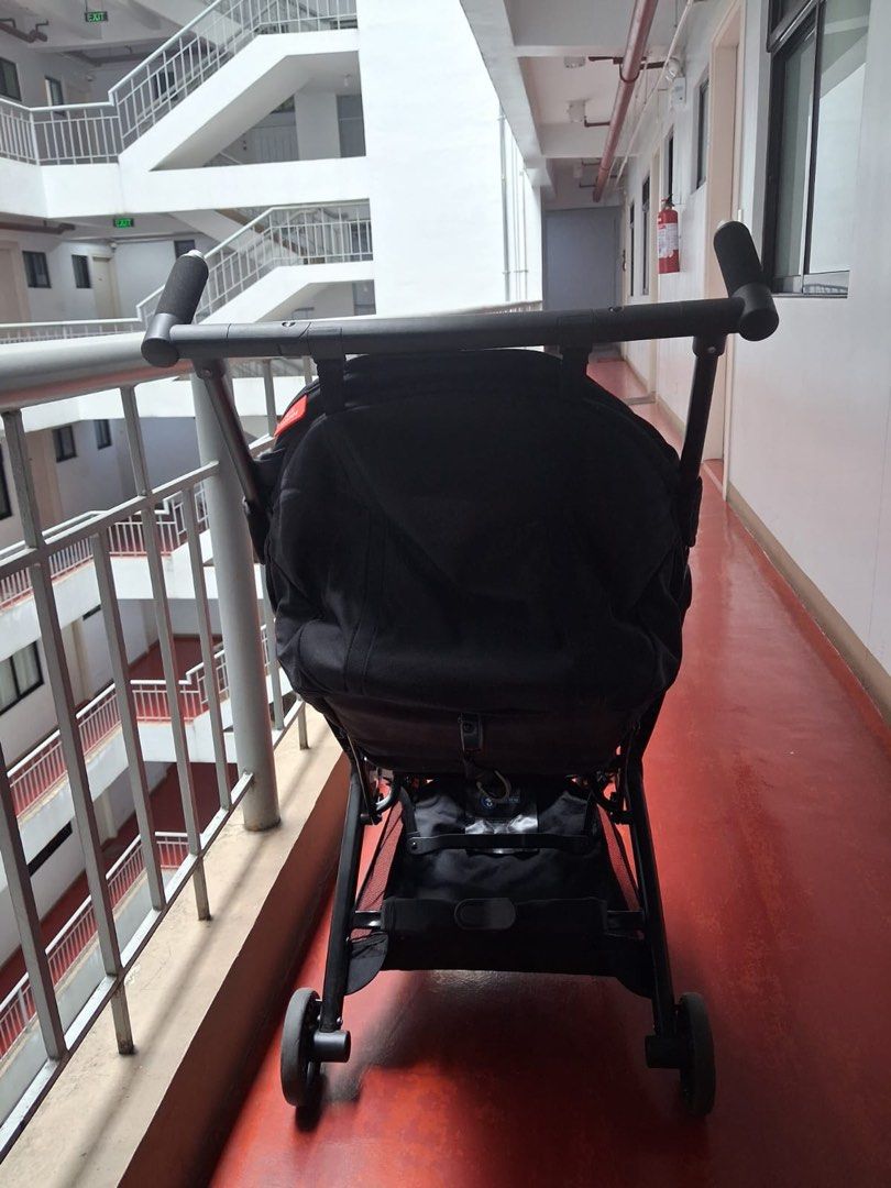 GB Compact Baby Stroller (Category: Strollers) located in Cainta. Submitted by kailiz (Listing ID 1469574985, Image 3). Description: - Sleek all-black compact stroller, perfect for travel and everyday use - Fully enclosed canopy protects baby from sun and wind - Spacious under-seat storage basket for diaper bags and groceries - Comfortable foam-grip push handle for smooth steering - Sturdy frame with smooth-rolling wheels - Quick and easy fold de