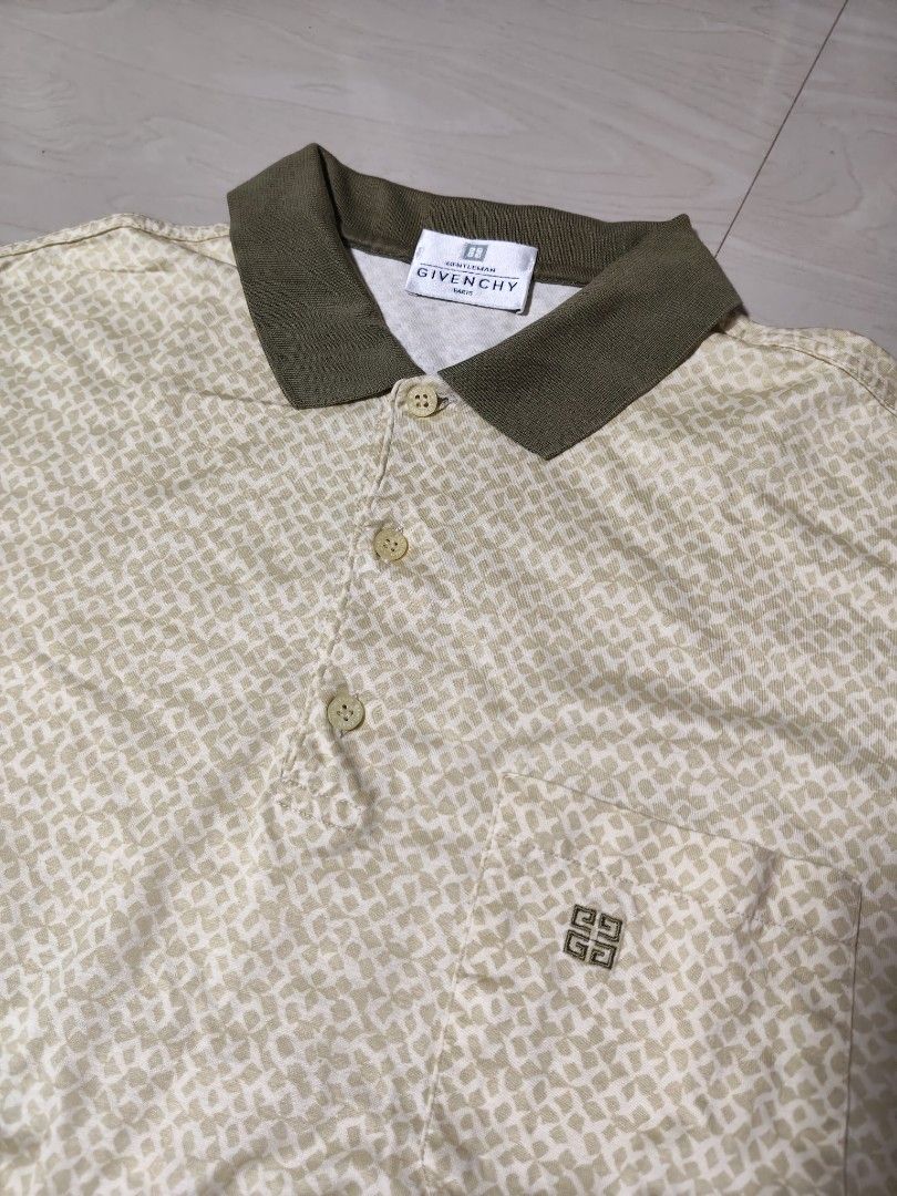 Gentleman Givenchy Vintage Pattern Polo Shirt (Category: Tshirts & Polo Shirts ) located in Manila. Submitted by si_yannnn (Listing ID 1469721428, Image 2). Description: Gentleman Givenchy polo shirt from Paris. Cream and beige geometric pattern all over with olive green collar. Single chest pocket featuring the Givenchy 4G logo embroidery. Made in Italy, 100% cotton fabric. Button placket at the front..
