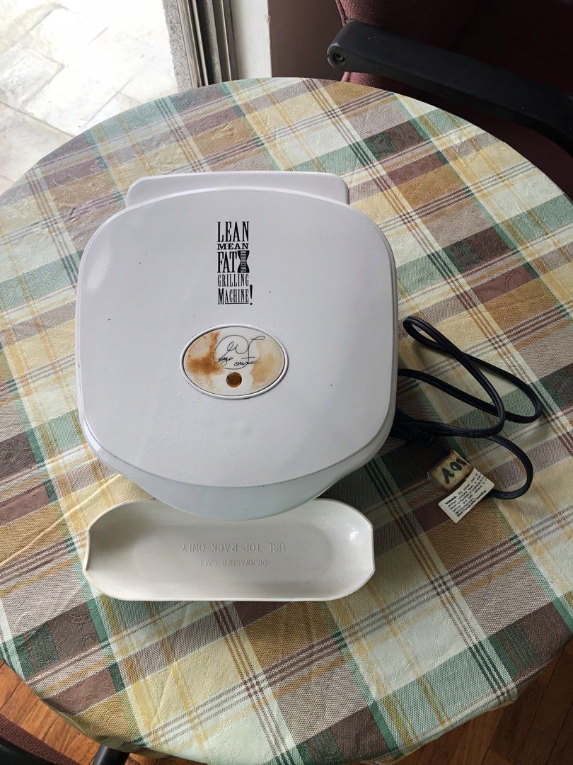 GEORGE FOREMAN LEAN MEAN FAT GRILLING MACHINE 110V (Category: Other Kitchenware & Tableware) located in Manila. Submitted by winnieyols (Listing ID 1469674056, Image 1). Description: GEORGE FIREMAN LEAN MEAN FATGRILLING MACHINE. - USED WITH ISSUES Pls see photos … broken at the side but still can be used…. Due to mishandling. - 110V bought in the USA - PHP 300.00 only - RFS: the owner transfered to a smaller house with no 110V outlet anymore… - M