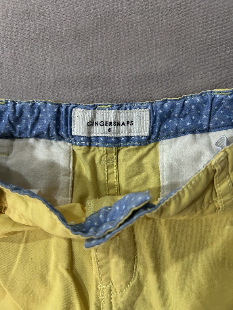Gingersnaps Yellow Pants Size 6 (Category: Babies & Kids Fashion) located in Quezon City. Submitted by poaimommy (Listing ID 1469585344, Image 3). Description: - Brand: Gingersnaps - Size: 6 - Color: Bright yellow with cute blue star patterned inner waistband. Waistband is adjustable - Pockets: Front and back pockets with button closures - Condition: Great pre-loved condition (ready to wear).